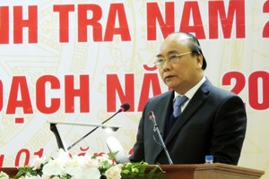 政府總理阮春福在會議上發表講話。（圖源：明范）