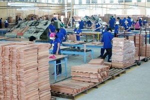 必須繼續為企業解除經營障礙。