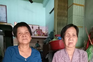 湯女（右）和妹妹都患有多種病。