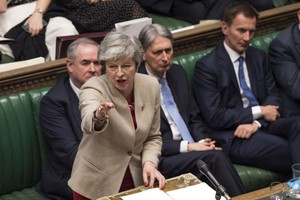 英國首相特蕾莎·梅在會議。（圖源：EPA）