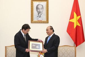 政府總理阮春福接見日本環保專家。（圖源：越通社）