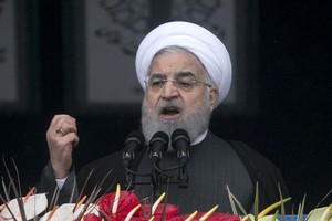 魯哈尼指伊朗仍會留在協議內。（圖源：新華社）