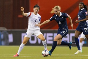 法國（藍衣）與韓國比賽一瞥。（圖源：互聯網）