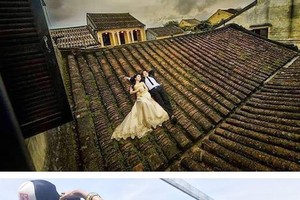 在會安古埠的古屋頂上拍婚照是侵犯遺跡的行為。