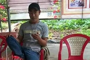 被通緝的嫌犯黃玉安。（圖源：周明）