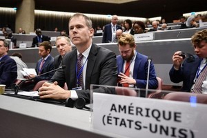 圖為美國代表 9月24日於日內瓦萬國郵政緊急會議上。（圖源：AFP）