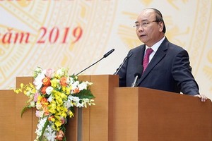 阮春福總理在會議上致詞。（圖源：光孝）