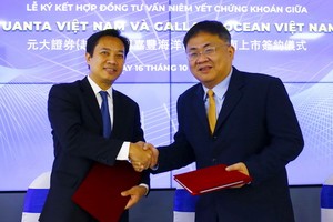 越南元大證券公司總經理黎明心(左)與越南嘉豐海洋公司副總經理吳誌尉代表簽約。