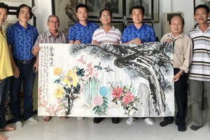 越中書畫家與合作的《藝海揚波》作品。