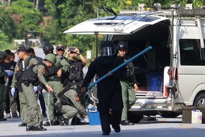 大批警方在現場戒備。（圖源：AFP）