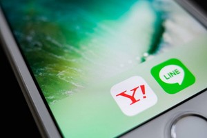 據悉，雅虎日本與LINE完成合併後，將擁有過億用戶，主要業務將聚焦於人工智能、電子商務、互聯網金融、移動支付等領域。 （示意圖源：Bloomberg）