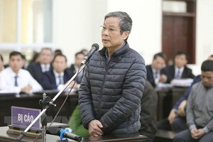 被告人阮北山在法庭上回答審判長問案。（圖源：越通社）