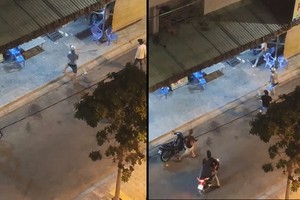 兩夥青年因發生爭執導致互毆，在一陣亂打混戰中，疑有人開槍造成兩人受傷。（圖源：視頻截圖）