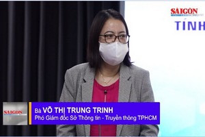 市新聞與傳播廳副廳長武氏忠貞在新聞發佈會上公佈有關本市展開新冠肺炎疫情防控工作安全評估應用程式。（圖源：視頻截圖）