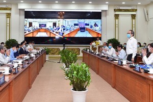 恢復與發展本市經濟座談會一瞥。（圖源：越勇）