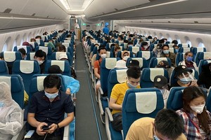 越南航空局：自本月18日至下月15日期間，預計將有21班機運送越南公民從國外回國。（示意圖源：D. Ngọc）