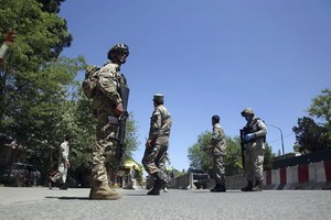 圖為在喀布爾戒備的阿富汗安全部隊。