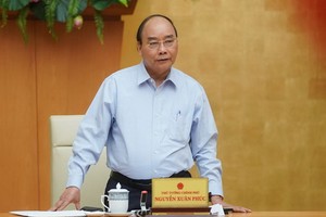 政府總理阮春福主持會議並發表演講。（圖源：光孝）