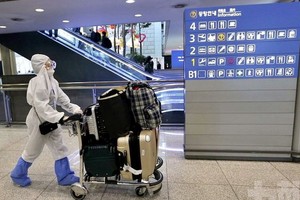 韓國政府決定從20日起再次針對全球所有國家和地區發佈為期一個月的旅遊特別預警至7月19日。（圖源：AP）