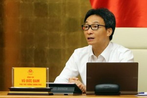 政府副總理、新冠肺炎疫情防控國家指委會主任武德膽主持會議。（圖源：VGP）