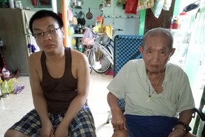 陳清和老大伯與智障外孫杜金光。