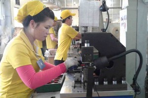 機器行業有助於促進發展越、印合作關係的發展。