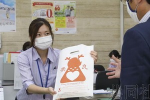 日本奈良在地企業開發用米糠做成的「鹿紙袋」。（圖源：共同社）