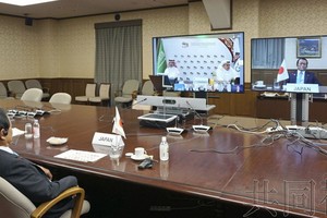 日本首相菅義偉同G20領導舉行線上首腦會議。（圖源：共同社）