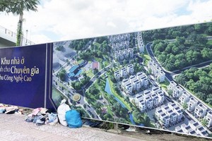 專家住房區圍牆外邊，這塊地皮以前是武氏造、阮文顯和其他許多民戶的土地。