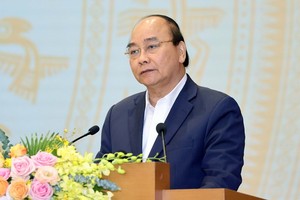 政府總理阮春福在會上發表講話。（圖源：越通社）