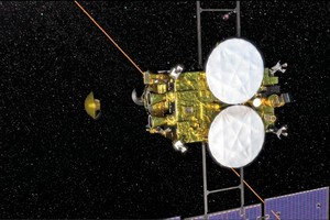 日本宇宙航空研究開發機構（JAXA）5日宣布，探測器“隼鳥2號”（右）當天成功分離密封艙（左）。（圖源：歐新社）