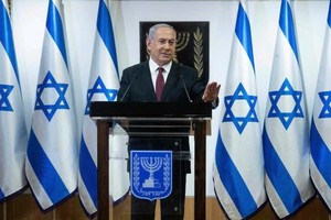 12月22日，以色列總理內塔尼亞胡在耶路撒冷發表電視講話。（圖源：新華社）