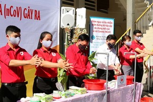 向人民宣傳防疫。（圖源：越通社）