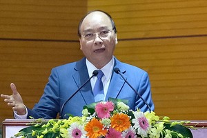 政府總理阮春福在會上致詞。（圖源：陳明）