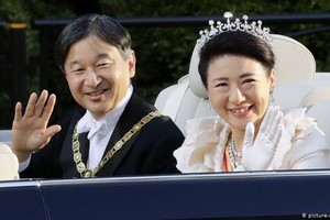 日本天皇德仁伉儷。（圖源：共同社）