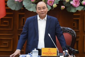 政府總理阮春福在會上發表講話。（圖源：光孝）