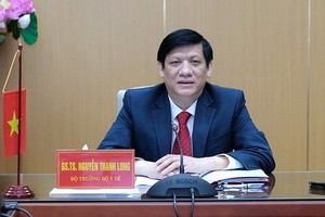 衛生部長阮清隆與柬埔寨衛生部長舉行視像會議時發言。（圖源：陳明）