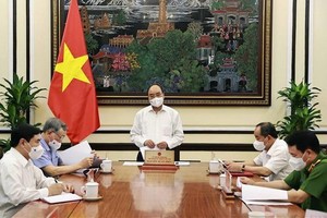 國家主席阮春福（中）主持會議。（圖源：越通社）