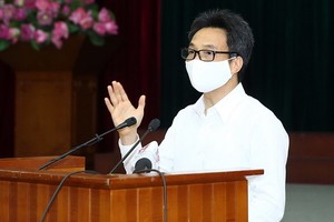 政府副總理、國家新冠肺炎疫情防控指委會主任武德膽在新聞發佈會上發言。（圖源：VGP）