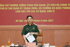 國防部部長潘文江上將在會議上發言。（圖源：仁義）