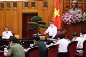 政府總理范明政主持會議。（圖源：越通社）