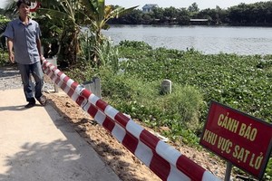 流經福門縣二平鄉的西貢右岸圍堤塌陷，已獲加固並豎立警示牌。