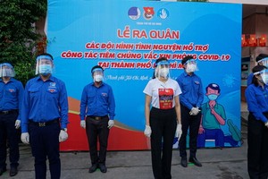 志願青年隊伍援助新冠疫苗接種行動出發儀式。（圖源：越通社）