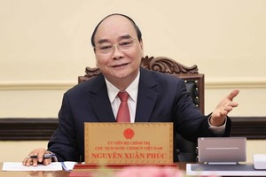 國家主席阮春福與羅馬尼亞總統電談