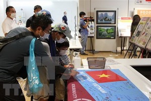 日本東京都國分寺市市民為越南體育代表團助威。（圖源：越通社）