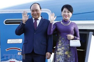 國家主席阮春福與夫人。（圖源：越通社）