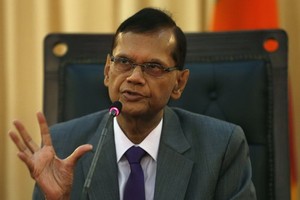 斯里蘭卡外長加米尼‧ 拉克什曼‧佩里斯。（圖源：路透社）