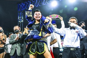 我國首位拳手獲得世界拳王金腰帶