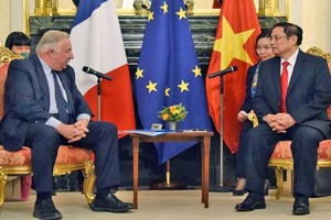 范明政總理會見法國參議院議長拉徹爾。（圖源：越通社）