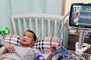 梁智雄在醫院接受醫治。